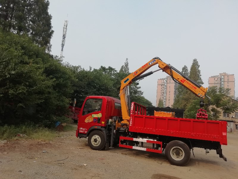 重汽豪曼蓝牌带抓具随车吊
